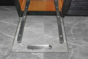 A pull-out acrylic tray with aluminum hardware, an interior storage feature.