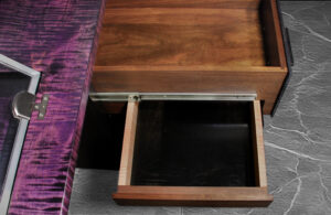 Hidden drawer detail protruding from a secret spot