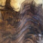 Close up example of unfinished figured walnut.