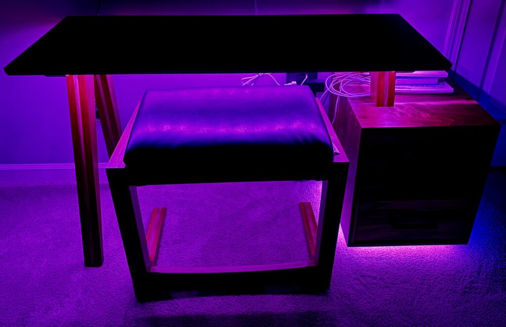 Custom luxury vanity desk and chair with LED lighting, handcrafted by Majesty Woodworks